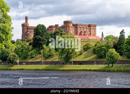 Inverness Castle and Sheriff Court from the banks of the River Ness - Highland Scotland - United Kingdom. Inverness - 18th of July 2021 Stock Photo