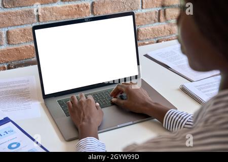 Young black business woman using laptop computer white mockup template screen. Stock Photo