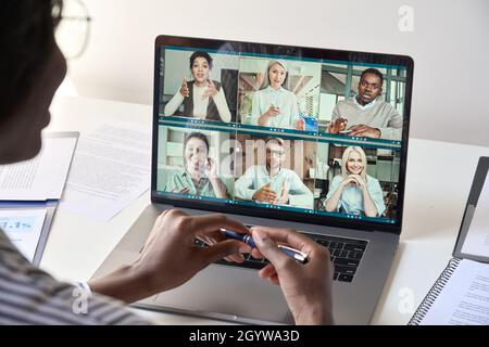 Black woman manager having virtual meeting with diverse business people. Stock Photo