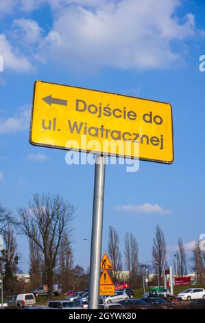 POZNAN, POLAND - Apr 11, 2016: A yellow sign showing redirection to the Wiatracznej street Stock Photo