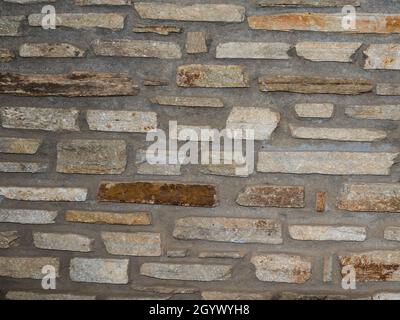 Rustic natural stone wall, textured background Stock Photo