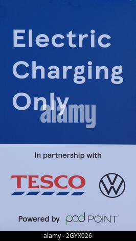 Electric Charging Only, sign, bay, car park, pod point, Tesco, Hunstanton, Norfolk, England Stock Photo