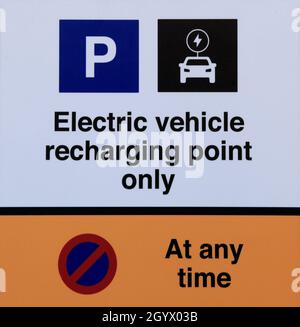 Electric vehicle, recharging point only, sign, Tesco car park, Hunstanton, Norfolk, England