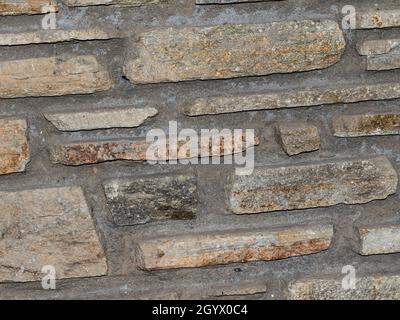 Rustic natural stone wall, textured background Stock Photo