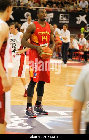 A Coruña, Spain. Serge Ibaka shooting for the basket during the friendly basketball match between Spain and Canada in A Coruña on August 6, 2014 Stock Photo