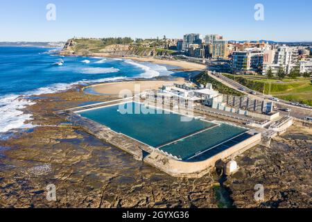 Aerial view of the historic Newcastle Ocean Baths a prominent local landmark in the NSW city. Newcastle NSW Australia Stock Photo