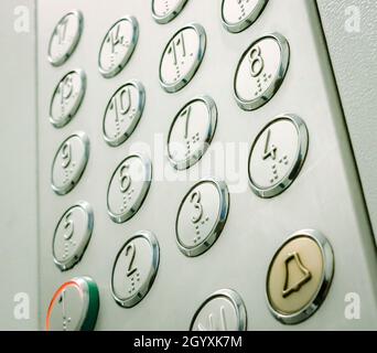 A modern panel with buttons in the elevator colored Stock Photo