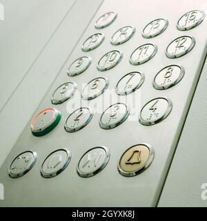 A modern panel with buttons in the elevator colored Stock Photo