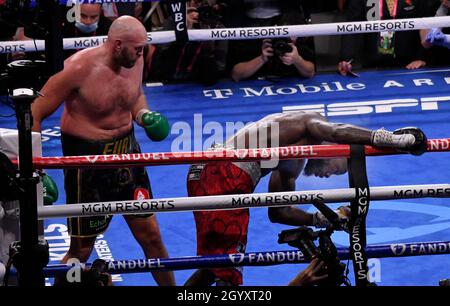 LAS VEGAS, NV - OCTOBER 09: ( In Blk trunks) Tyson Fury delivers a right cross hit during the 11 round and KO's  Deontay Wilder for the World Heavyweight Championship III trilogy fight at T-Mobile Arena Saturday October 9, 2021 in Las Vegas, Nevada.(MB Media) Stock Photo