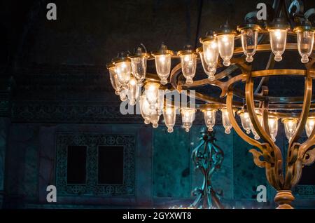 A close up photo of a elegance antique chandelier in Hagia Sophia in Istanbul. High quality photo Stock Photo