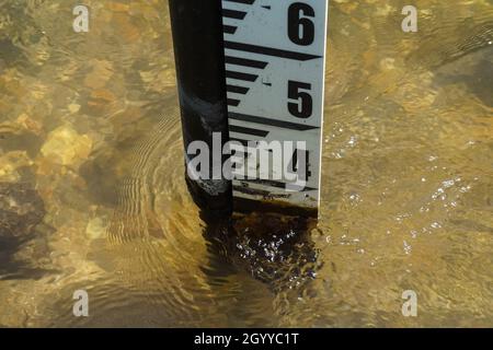 Water level gauge on a river Stock Photo