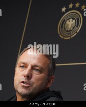 Hamburg, Germany. 10th Oct, 2021. Football: National team, press conference before the World Cup qualifier against North Macedonia. National coach Hansi Flick on the podium. Credit: Marcus Brandt/dpa/Alamy Live News Stock Photo