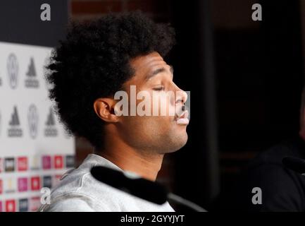 Hamburg, Germany. 10th Oct, 2021. Football: National team, press conference before the World Cup qualifier against North Macedonia. Serge Gnabry on the podium. Credit: Marcus Brandt/dpa/Alamy Live News Stock Photo