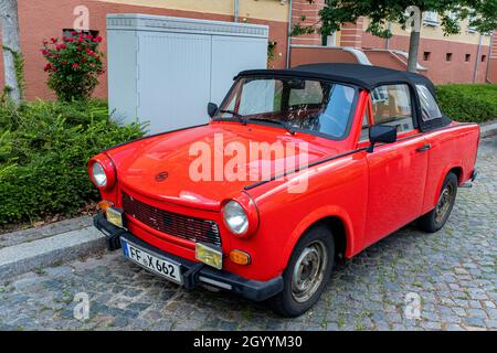 Frankfurt Oder, Germany. Totally refurbished DDR / GDR / East-German Trabi Cabriolet Car with red paint job. Trabi's are now a culture thing.
