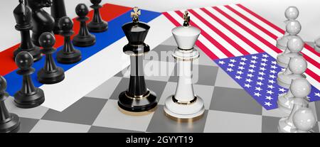 Russia and USA conflict, clash, crisis and debate between those two countries that aims at a trade deal and dominance symbolized by a chess game with Stock Photo