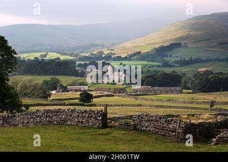 View down to the market town of Hawes in Wensleydale, Yorkshire Dales National Park, UK. St Margaret's Church in centre. Stock Photo