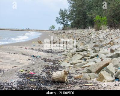 Stone embankment protected beach in Can Gio district, Ho Chi Minh City, Vietnam Stock Photo