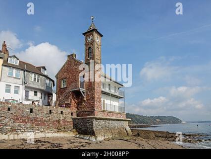 Kingsand from the beach featuring the Maker with Rame Institute, with its clock tower is an iconic grade 2 listed building at the heart of the communi Stock Photo