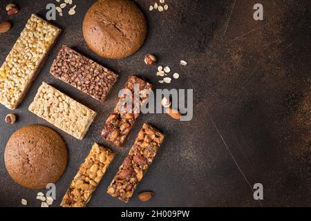 Different energy protein bars on dark background Stock Photo