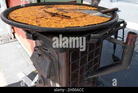 Socca, a chickpea pancake, is a favourite snack in Nice, France Stock Photo