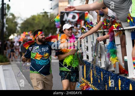 Participants of the Come Out With Pride Festival and Parade in downtown Orlando Florida on October 9, 2021. Tens of thousands of members of the LGBTQ community and their allies gathered for the annual event in Lake Eola Park. (Photo by Ronen Tivony/Sipa USA) *** Please Use Credit from Credit Field *** Stock Photo