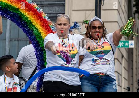 Participants of the Come Out With Pride Festival and Parade in downtown Orlando Florida on October 9, 2021. Tens of thousands of members of the LGBTQ community and their allies gathered for the annual event in Lake Eola Park. (Photo by Ronen Tivony/Sipa USA) *** Please Use Credit from Credit Field *** Stock Photo