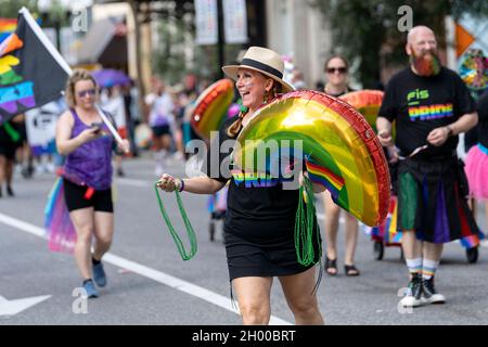 Participants of the Come Out With Pride Festival and Parade in downtown Orlando Florida on October 9, 2021. Tens of thousands of members of the LGBTQ community and their allies gathered for the annual event in Lake Eola Park. (Photo by Ronen Tivony/Sipa USA) *** Please Use Credit from Credit Field *** Stock Photo