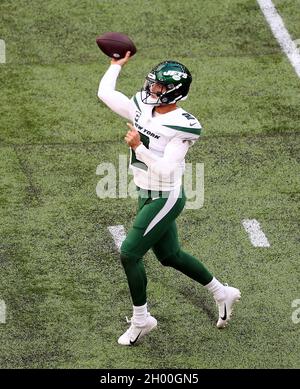 New York Jets quarterback Zach Wilson looks for a pass during the match which is part of the NFL London Games at Tottenham Hotspur Stadium, London. Picture date: Sunday October 10, 2021. Stock Photo