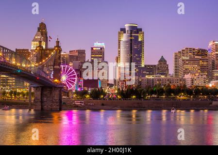 Cincinnati Skyline Sunset - Ohio River - Roebling Bridge Stock Photo