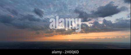 Panorama of the sky with clouds at sunset Stock Photo