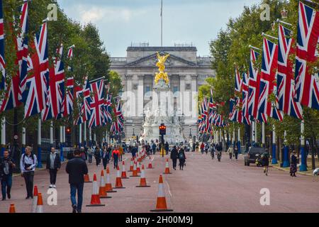 Buckingham Palace and The Mall with Union Jack flags, London, UK, 10 October 2021. Stock Photo
