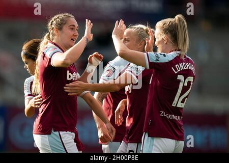 West Ham United's Claudia Walker celebrates scoring their side's first goal of the game with team-mate Kate Longhurst during the FA Women's Super League match at Chigwell Construction Stadium, London. Picture date: Sunday October 10, 2021. Stock Photo