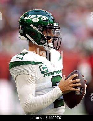 New York Jets quarterback Zach Wilson looks for a pass during the match which is part of the NFL London Games at Tottenham Hotspur Stadium, London. Picture date: Sunday October 10, 2021. Stock Photo