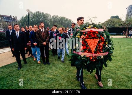 Paris, France, Crowd Marching Memorial Ceremony Homosexuel Deportation, during World War 2, WWII AND pink triangle gay, commemorating paris April, 1995 Stock Photo
