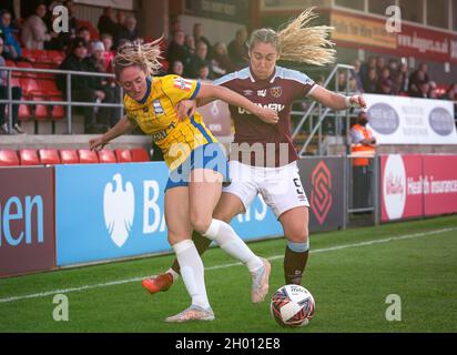 Birmingham City's Rebecca Holloway and West Ham United's Claudia Walker during the FA Women's Super League match at Chigwell Construction Stadium, London. Picture date: Sunday October 10, 2021. Stock Photo