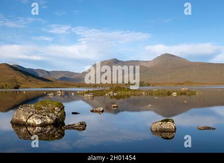 Lochan na h-Achlaise Is a small loch located in the remote and stunningly scenic Rannoch Moor in the West Highlands of Scotland. Stock Photo