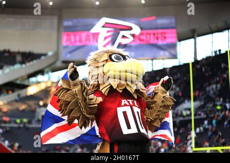 ATLANTA, GA - NOVEMBER 18: Falcons mascot Freddie shoots t-shirts into the  crowd before the Thursday night NFL game between the Atlanta Falcons and  the New England Patriots on November 18, 2021