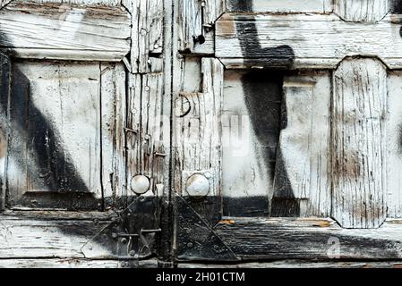 Old wooden shutters painted in various colors and full of nails. Vector wood texture Stock Photo
