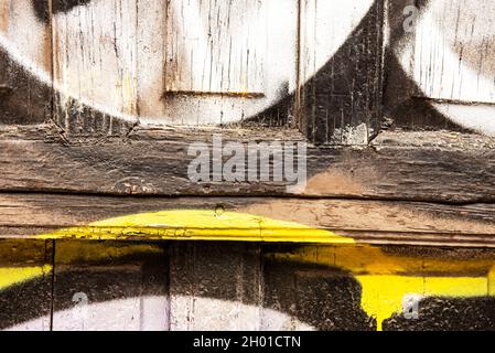 Old wooden doors painted on the street in various spray colors. Vector wood texture Stock Photo