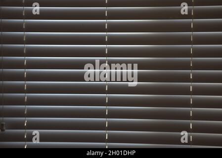 Shadow lines, sunshine through venetian blinds Stock Photo