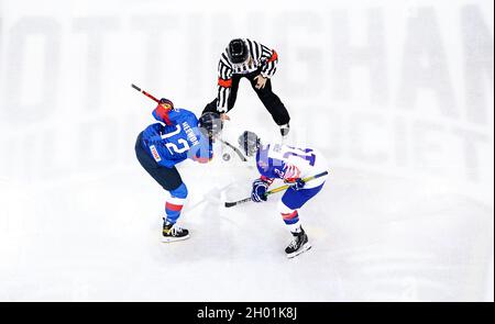 Great Britain's Louise Adams (right) and Republic of Korea's Kim Hee-won battle for the puck during the Beijing 2022 Olympics Women's Pre-Qualification Round Two Group F match at the Motorpoint Arena, Nottingham. Stock Photo