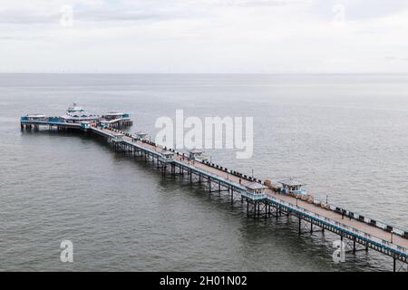 Looking down on Llandudno Pier from the vantage point of the cable car on the way to the Great Orme seen in October 2021 on the North Wales coastline. Stock Photo