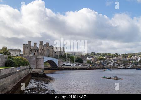 A multi image panorama of Conwy Castle and harbour seen in October 2021 in North Wales. Stock Photo