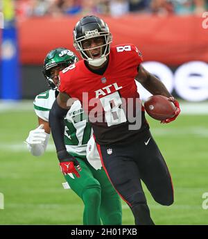 NFC tight end Kyle Pitts of the Atlanta Falcons (8) celebrates a touchdown  pass over the AFC du …