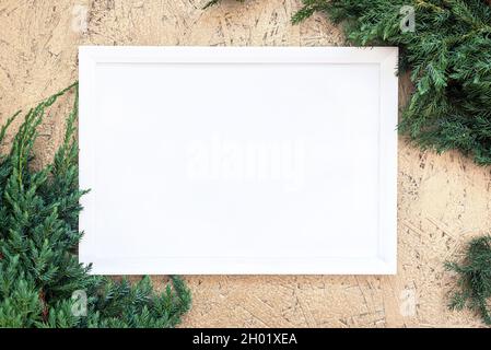White empty frame on golden christmas background Stock Photo
