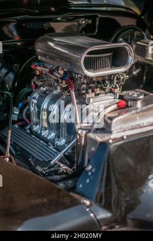 Supercharged v8 engine of a classic car. Stock Photo