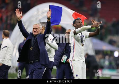 Milan, Italy. 10th Oct, 2021. Paul Pogba of France and Didier Deschamps Head Coach of France celebrate the victory at the end of the match during the UEFA Nations League Finals 2021 final football match between Spain and France at Giuseppe Meazza Stadium, Milan, Italy on October 10, 2021 Credit: Live Media Publishing Group/Alamy Live News Stock Photo
