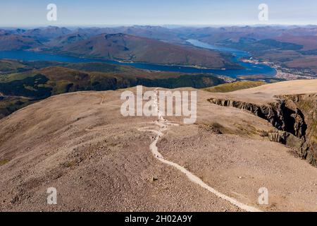 Aerial view of the footpath to the summit of Ben Nevis with several sea Lochs in the background. Stock Photo