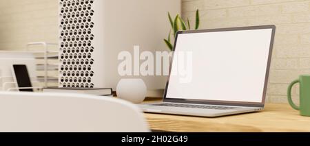 Modern home working space with laptop computer blank screen mockup on wooden table with electronic devices. 3d rendering, 3d illustration Stock Photo