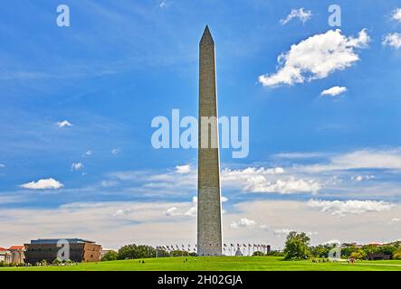Washington DC, USA-August 19, 2021: View of the Washington Monument with African American Museum building next to it Stock Photo